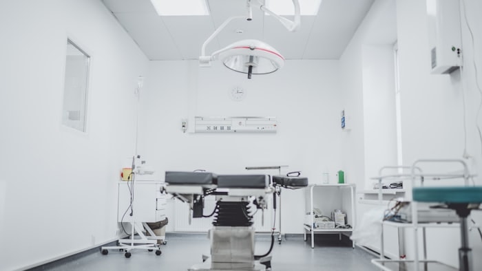 Surgical team walking down a hospital corridor
